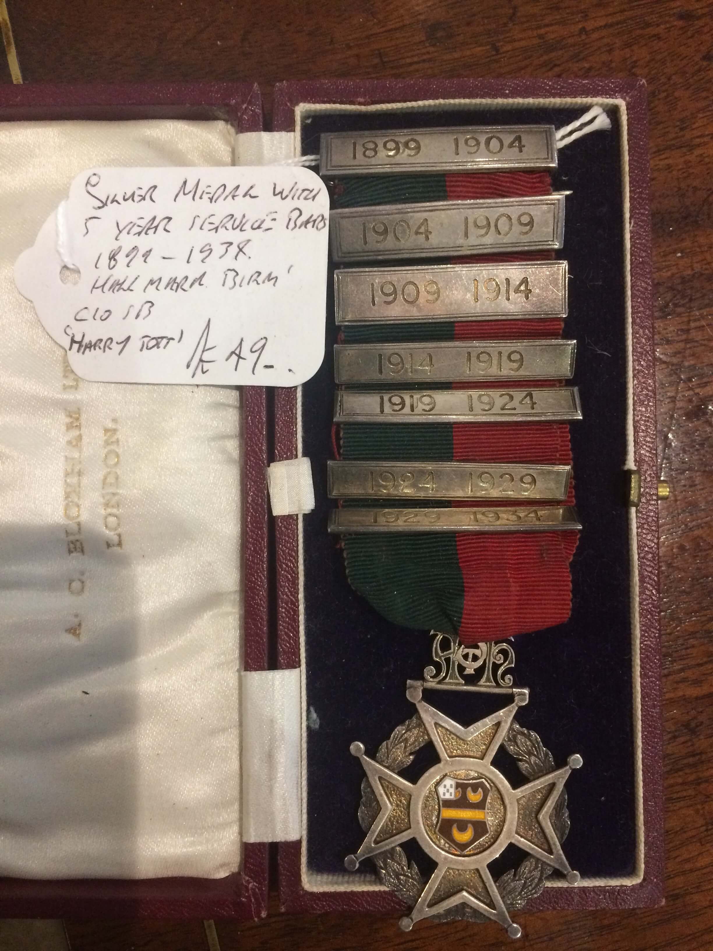 Silver Medal with Five Year Service Bars